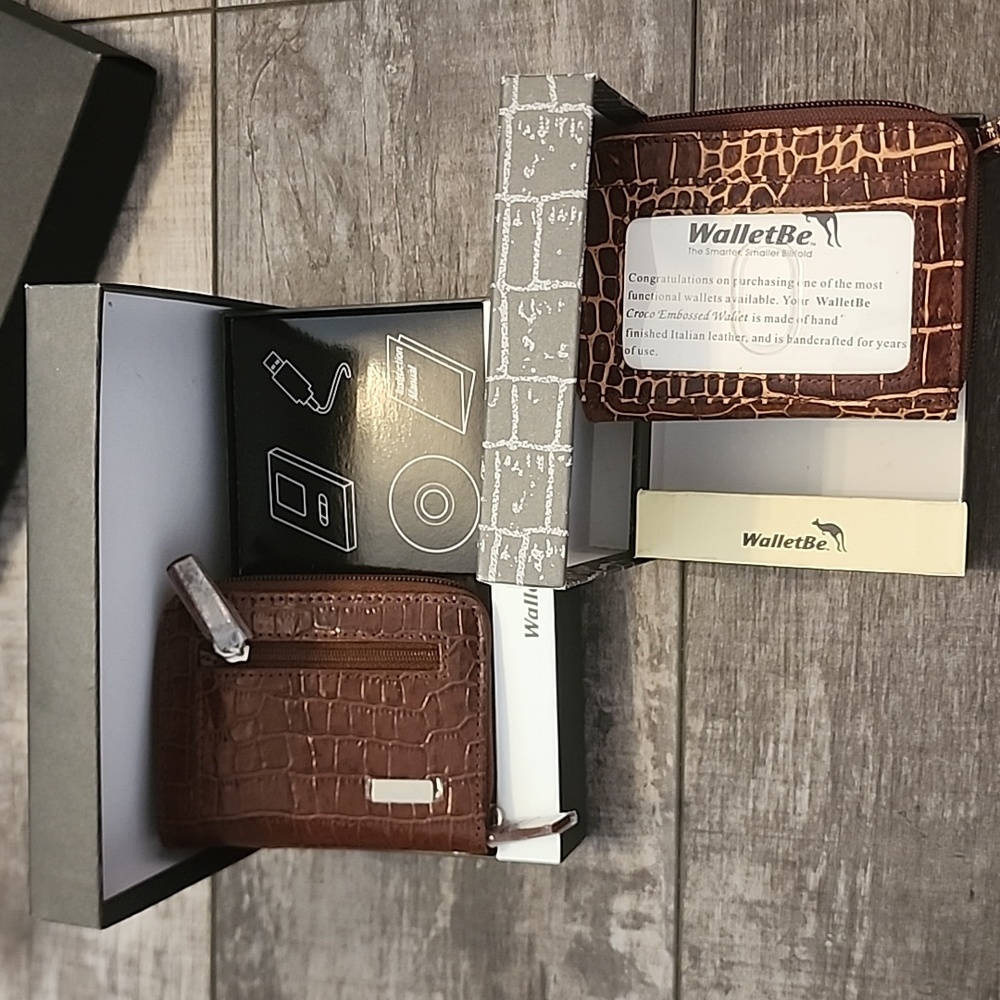PAIR of genuine leather wallets